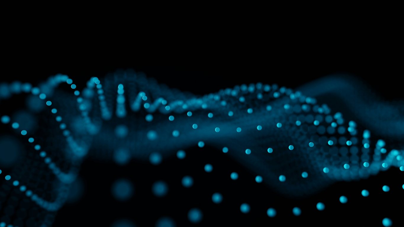 A wave of glowing blue particles forming a mesh against a black field